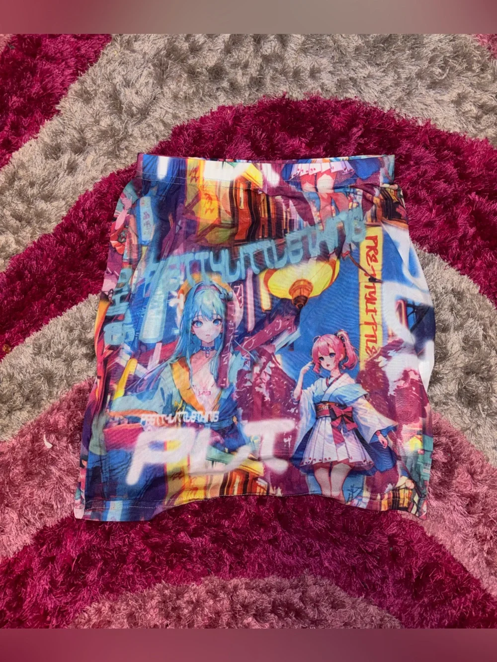 PrettyLittleThing Blue, Pink & Yellow Anime Print Mini Skirt‎
